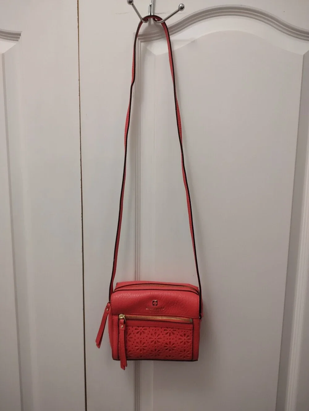 Kate Spade Coral Pink Leather Crossbody Bag with Floral Cutout